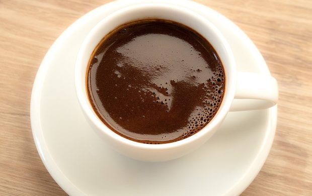 cup of coffee made on tradinonal way (Grand coffee made in džezva, without milk or sugar. Part of Serbian cuisine.)