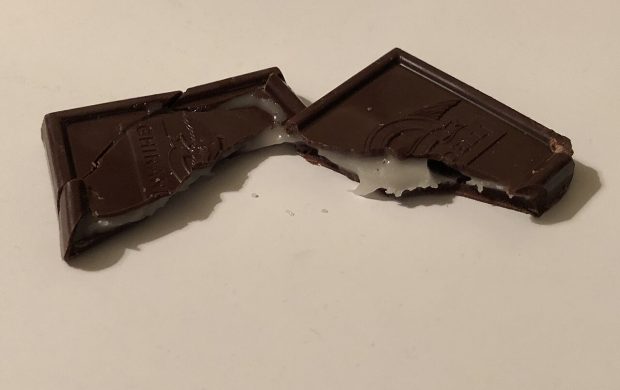A Ghirardelli Dark Chocolate Mint Square broken into two pieces in the Parkway Village section of Ewing Township, Mercer County, New Jersey