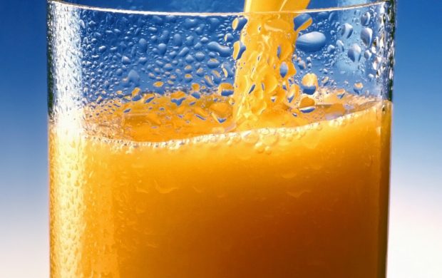 A glass of Orange juice.